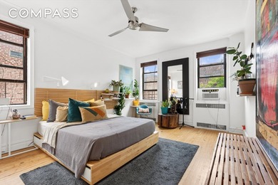 Situated on a picturesque, tree-lined residential block, this - photo 3