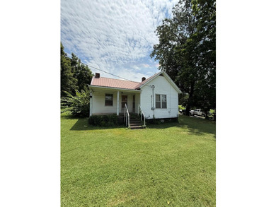 Opportunity knocks with this 1,343 sq. ft. home sitting on a - photo 1