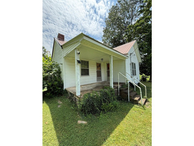 Opportunity knocks with this 1,343 sq. ft. home sitting on a - photo 2