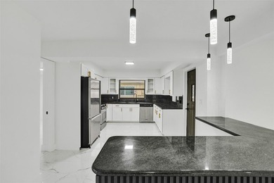 This single family home in Plantation Isles offers a practical - photo 6