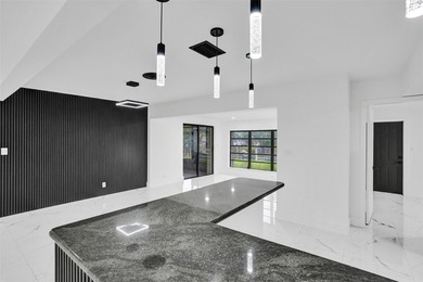 This single family home in Plantation Isles offers a practical - photo 10