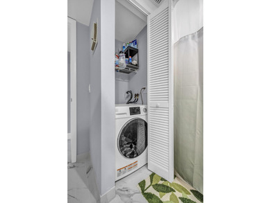 Completely updated first floor 2 bedroom, 2 bath residence in - photo 13