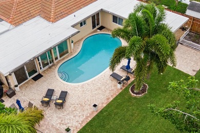 Discover this beautifully maintained 3-bedroom, 2-bath pool home - photo 1
