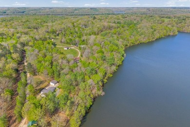 Escape to the tranquility of rural waterfront living! This - photo 39
