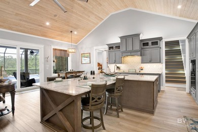 Welcome to an extraordinary custom-built luxury residence on one - photo 13