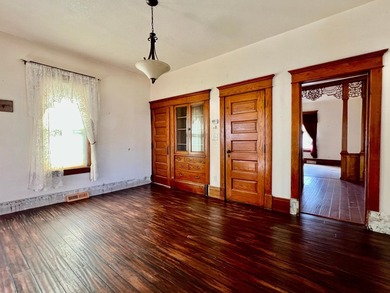 Charming cottage-style home showcasing distinctive woodwork - photo 5