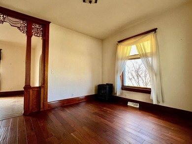 Charming cottage-style home showcasing distinctive woodwork - photo 6