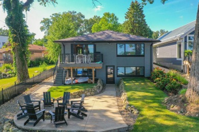 This four-bedroom, four-bath, 2,580-square-foot home - Lake Home For Sale in Edwardsburg, Michigan