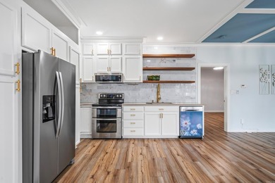 Wake up to the water every single day. This completely remodeled - photo 11