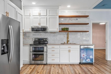 Wake up to the water every single day. This completely remodeled - photo 12