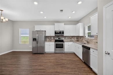 Move-in ready 4 bedroom 2 1/2 bath in Lakeside just in time for - photo 12