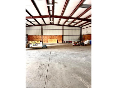 This versatile industrial property offers two buildings on over - photo 21