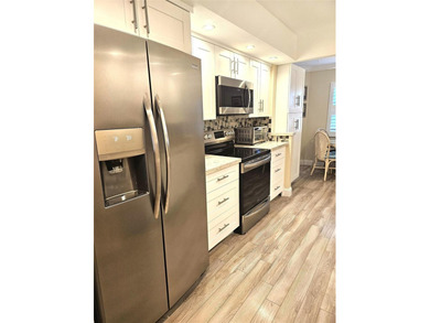 (private lake, pond, coastal) Condo Active Under Contract in Coconut Creek Florida