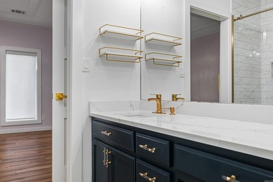 Wake up to the water every single day. This completely remodeled - photo 24