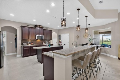 Virtually Staged. Enjoy golf and water views from this - photo 12
