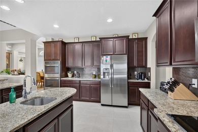 Virtually Staged. Enjoy golf and water views from this - photo 16