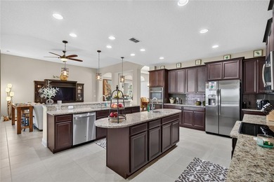 Virtually Staged. Enjoy golf and water views from this - photo 17