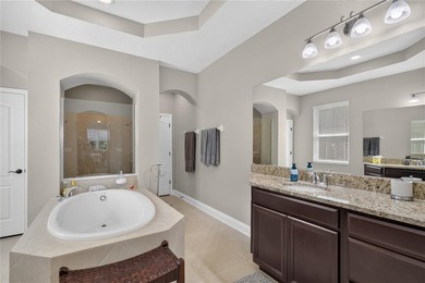 Virtually Staged. Enjoy golf and water views from this - photo 22