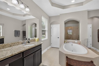 Virtually Staged. Enjoy golf and water views from this - photo 23