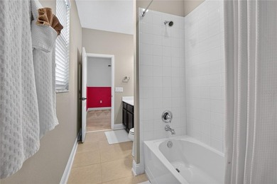 Virtually Staged. Enjoy golf and water views from this - photo 32