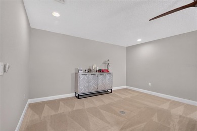 Virtually Staged. Enjoy golf and water views from this - photo 42