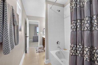 Virtually Staged. Enjoy golf and water views from this - photo 46