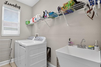 Virtually Staged. Enjoy golf and water views from this - photo 48