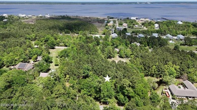 Discover the perfect setting for your coastal dream home with - photo 1