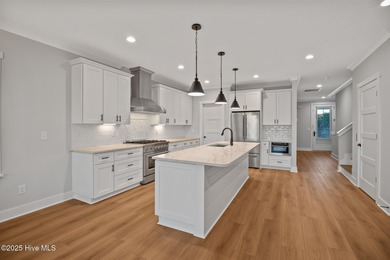 Experience refined coastal living in the heart of Emerald Isle