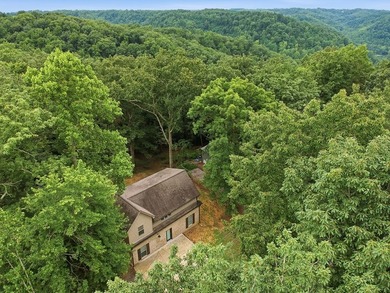 Tucked into a private, wooded setting just minutes from Center - photo 3