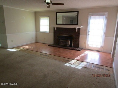 This spacious 4-bedroom, 3-bath brick home offers plenty of room