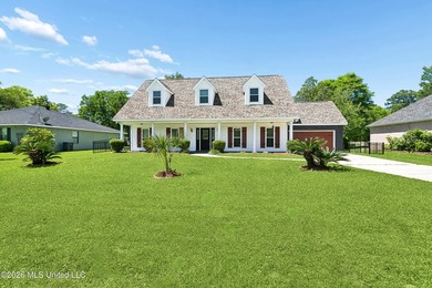 Located in the desirable golf community of Diamondhead, this - photo 1