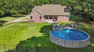 PRICE REDUCED! Situated on 7 acres with a pond and a 30' - photo 4