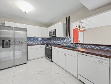Beautifully updated unit in an immaculate, well-managed Class A - photo 5