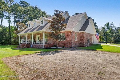 PRICE REDUCED! Situated on 7 acres with a pond and a 30' - photo 7