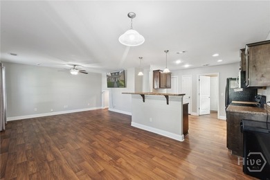 Tired of mowing your lawn? Then come check out this awesome home - photo 6