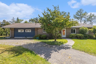 Lake Home For Sale in Wolverine Lake, Michigan