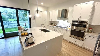 Welcome to this exceptional 4-bedroom, 3.5-bathroom residence in - photo 4