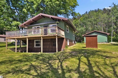 Enjoy beautiful views of Stoneledge Lake from the spacious back - photo 1