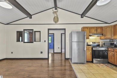 Enjoy beautiful views of Stoneledge Lake from the spacious back - photo 9