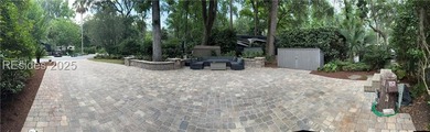 This gorgeous RV lot has a paver pad and a hardscape wall with - photo 7