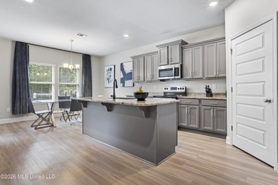 Welcome home to this beautifully maintained 4-bedroom, 3-bath - photo 12