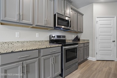 Welcome home to this beautifully maintained 4-bedroom, 3-bath - photo 13