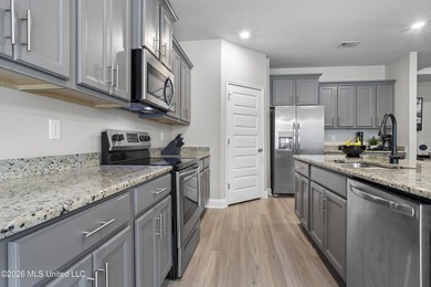 Welcome home to this beautifully maintained 4-bedroom, 3-bath - photo 14
