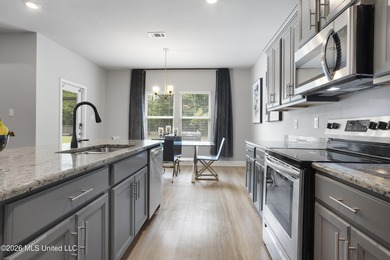 Welcome home to this beautifully maintained 4-bedroom, 3-bath - photo 16