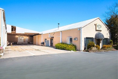 Rare Opportunity to Own a Versatile Warehouse Facility in the - photo 3