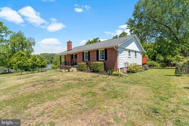Nestled at the end of a peaceful peninsula in the sought-after - photo 4