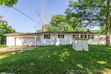Cute 3 bed 2 bath ranch style riverfront home situated on 2.40 - Lake Home For Sale in Camdenton, Missouri
