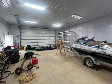 Enjoy nearly an acre of level waterfront property where the - photo 13