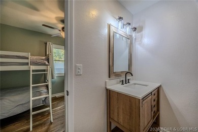 Discover your dream lake retreat on the 77-mile marker of Lake - photo 17
